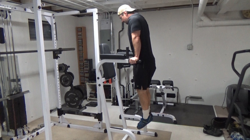Tighten Your Lower Abs With Vacuum Leg Raises With Feet Hooked
