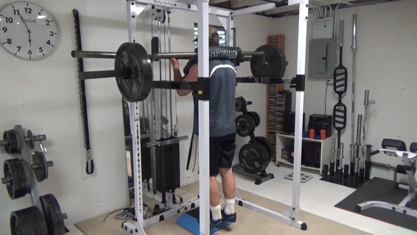 Self-Spotted Yoke Bar Standing Calf Raises Middle