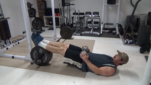 Roll-Up Barbell Plate Leg Curls  Weighted Start