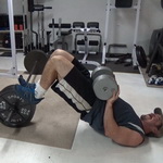 Roll-Up Barbell Plate Leg Curls