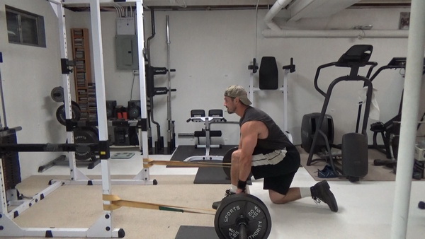 Horizontal Band Split Kneeling Deadlift Lockouts For Glute and Lower Back Strength Training start