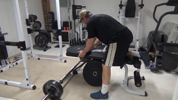 Range-Of-Motion Drop Sets for Chest-Supported Rows add a plate