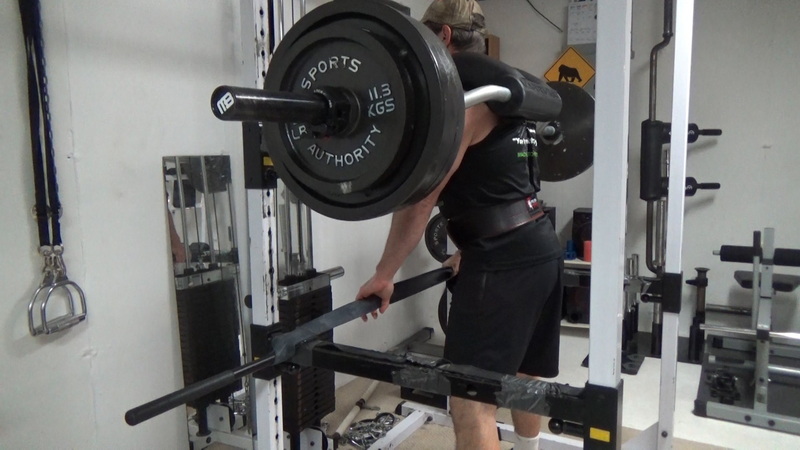 Band-Bounce Squats For Building Power Out of The Hole Grab Band