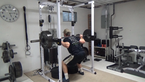 Elevation Change Squat Negatives For Building Strength bottom