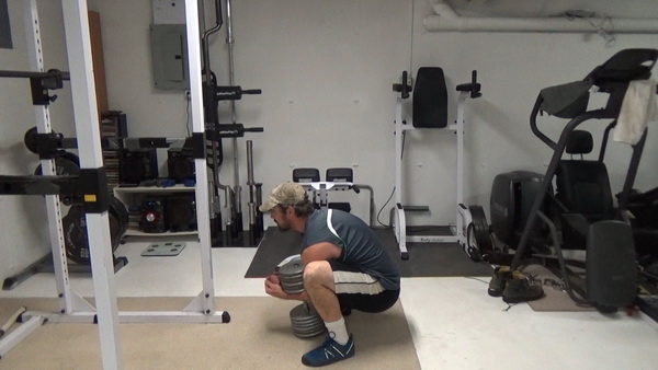 Dumbbell Zercher Squat Start