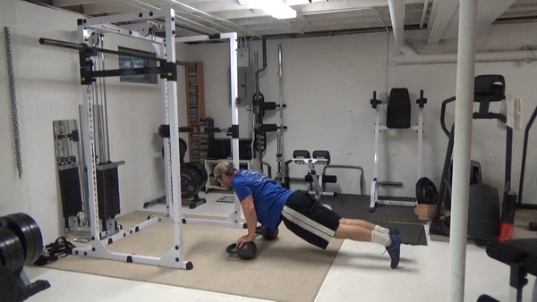 Push-Ups on the Bells of the Kettlebells